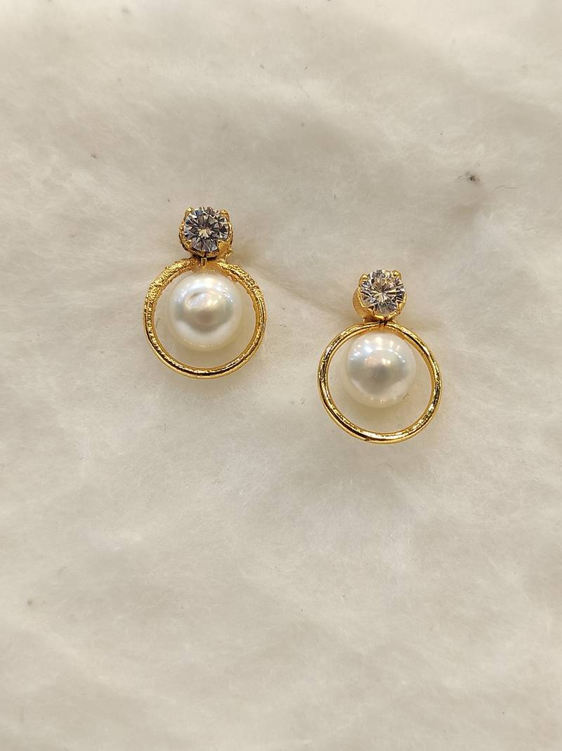 White pearl earrings