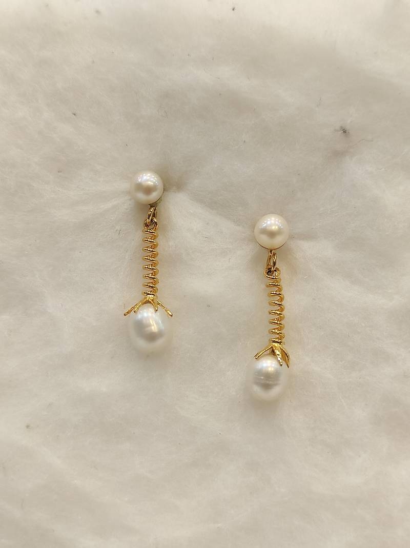 White pearl earrings