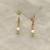 White pearl earrings