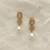White pearl earrings