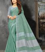 Sea green woven linen saree with blouse