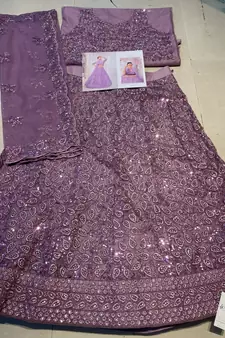Purple Wedding Wear Net Lehenga With Un Stitched Blouse
