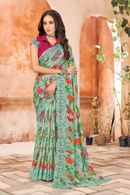 Sea green printed georgette saree with blouse 1