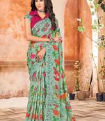 Sea green printed georgette saree with blouse