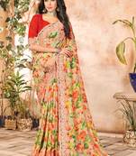 Peach printed georgette saree with blouse