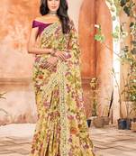 Cream printed georgette saree with blouse