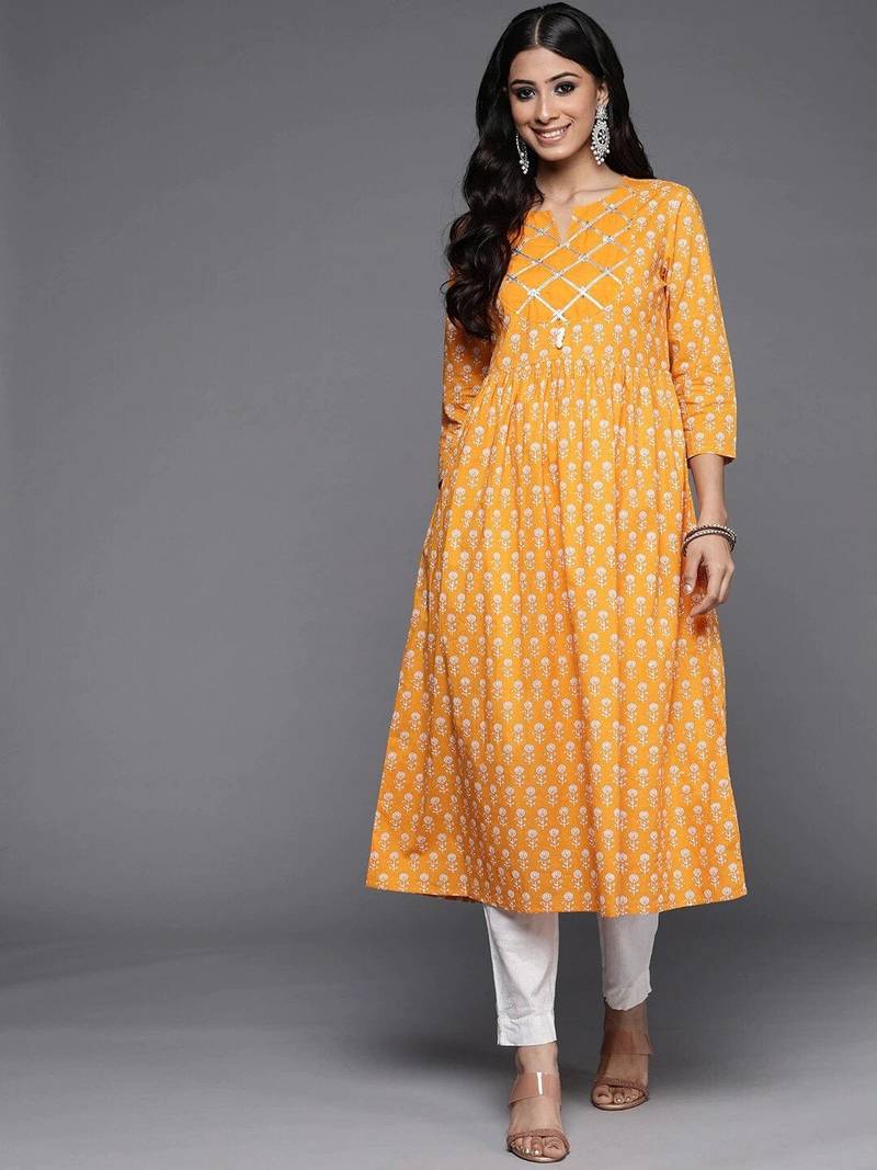 varanga-women-mustard-yellow-geometric-printed-keyhole-neck-flared-sleeves-quirky-kurta