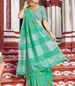 Green woven linen saree with blouse