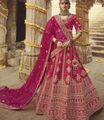 Rani-pink embroidered silk semi stitched lehenga