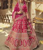 Rani-pink embroidered silk semi stitched lehenga