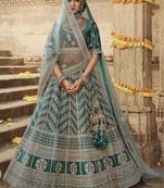 Teal embroidered silk semi stitched lehenga