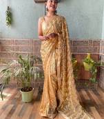 Light orange embroidered faux georgette saree with blouse