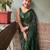 Dark green embroidered faux georgette saree with blouse