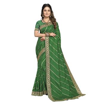 Green woven silk saree with blouse 1