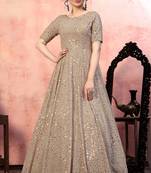 Alluring Beige Fancy Golden Sequins Georgette Party Wear Gown Semi Stitched