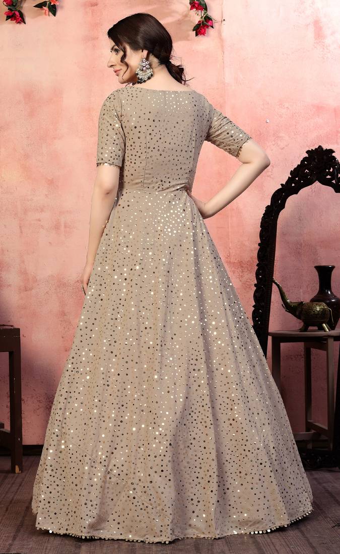 Alluring Beige Fancy Golden Sequins Georgette Party Wear Gown Semi Stitched