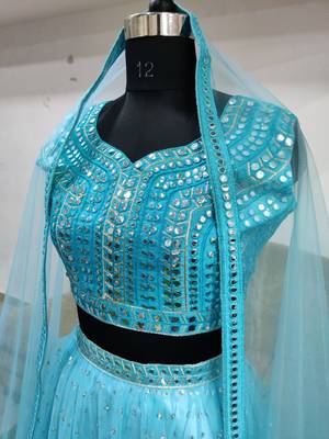 Bieth Alluring Light Blue Mirror Work Net Semi Stitched Lehenga 4