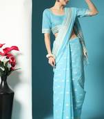 Dark green woven tussar silk saree with blouse