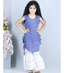 Purple gold jacquard printed kurti with tassles work paired with offwhite Sharara