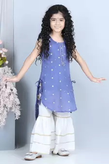 Purple gold jacquard printed kurti with tassles work paired with offwhite Sharara