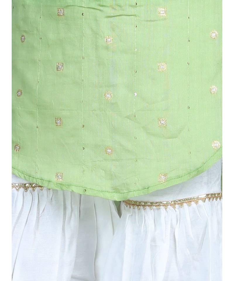 Green gold jacquard printed kurti with tassles work paired with offwhite Sharara