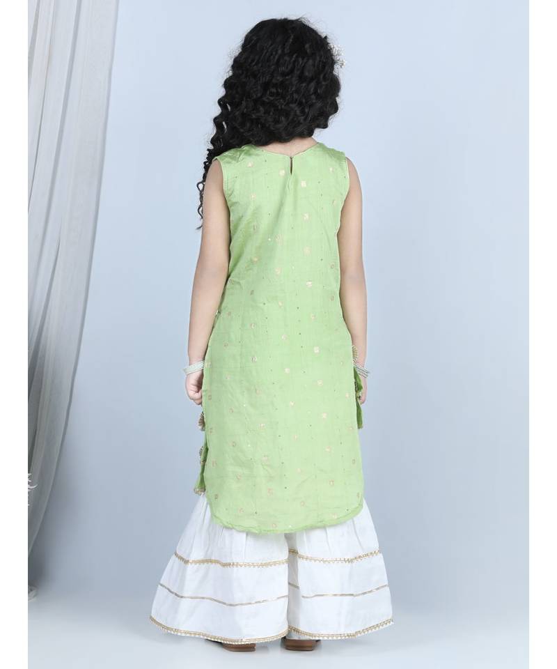 Green gold jacquard printed kurti with tassles work paired with offwhite Sharara