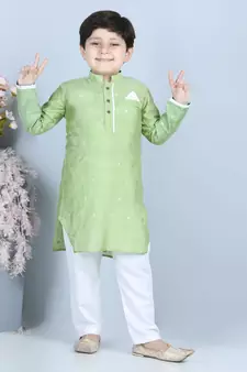 Green gold jacquard printed kurta with show pocket paired with white cotton pajama