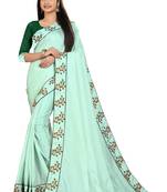 Light green embroidered silk saree with blouse