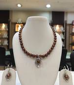 Brown pearl necklaces