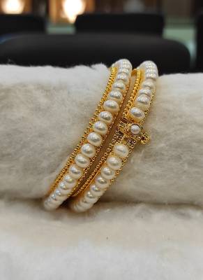 White pearl bangles-and-bracelets 1