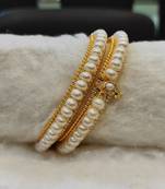 White pearl bangles-and-bracelets