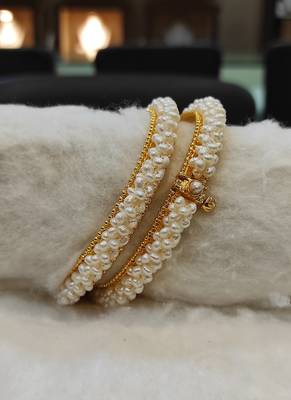 White pearl bangles-and-bracelets 1
