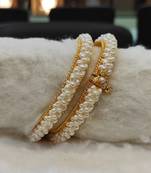 White pearl bangles-and-bracelets