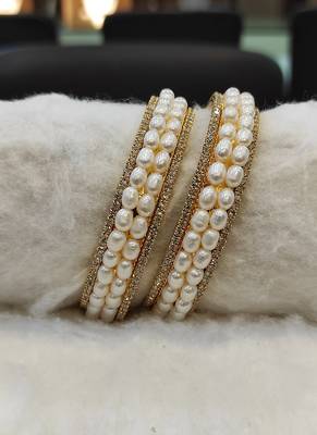 White pearl bangles-and-bracelets 1