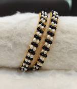 Black pearl bangles-and-bracelets