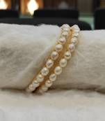 White pearl bangles-and-bracelets