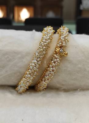 White pearl bangles-and-bracelets 1