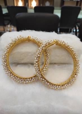White pearl bangles-and-bracelets 2