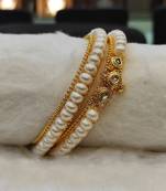 White pearl bangles-and-bracelets