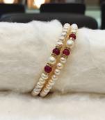 Red pearl bangles-and-bracelets