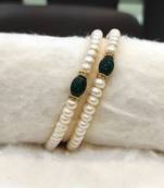 Green pearl bangles-and-bracelets