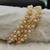 White pearl bangles-and-bracelets