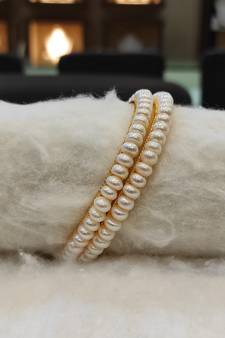 White pearl bangles-and-bracelets