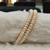 White pearl bangles-and-bracelets