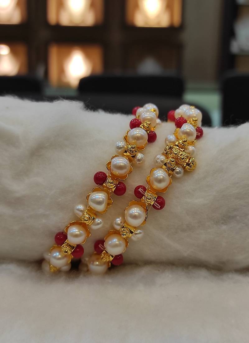 Red pearl bangles-and-bracelets