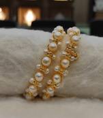White pearl bangles-and-bracelets