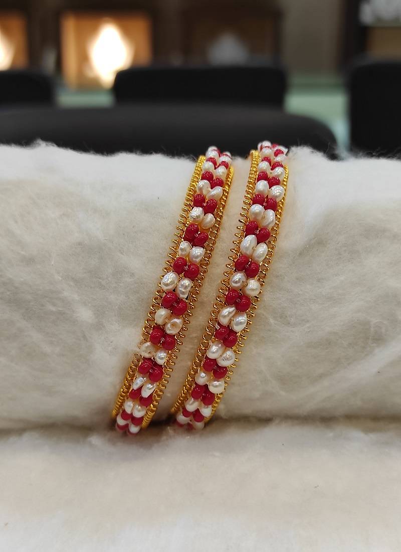 Red pearl bangles-and-bracelets