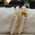 White pearl bangles-and-bracelets