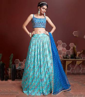 sky blue zari and sequins embroidered silk lehenga with mirror work choli and soft net dupatta 1