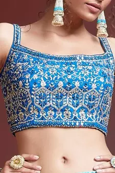 sky blue zari and sequins embroidered silk lehenga with mirror work choli and soft net dupatta